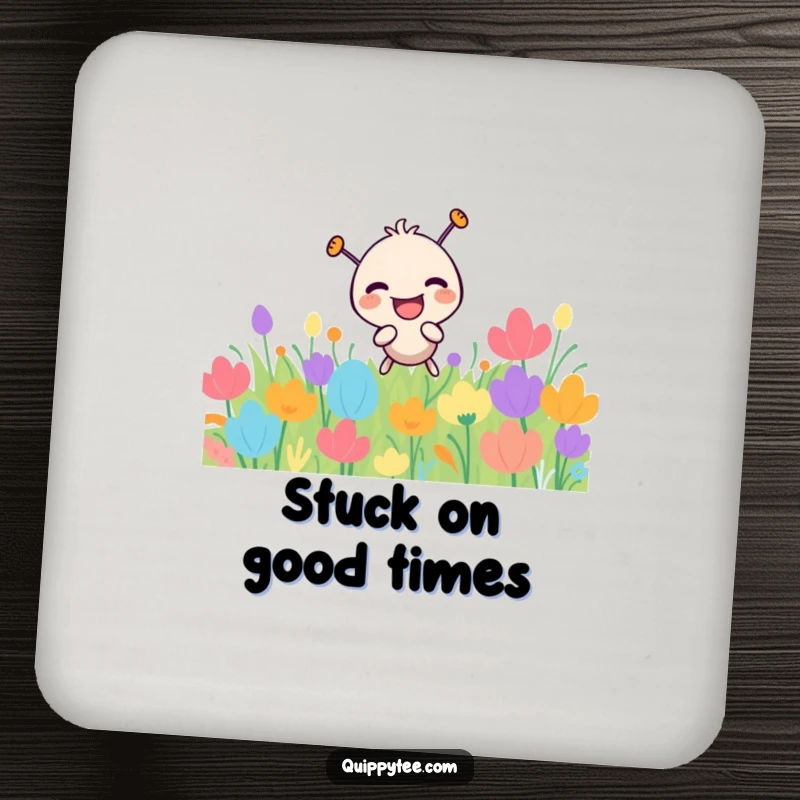 Funny laughing needle character playfully poking a colorful patch, on a decorative and protective drink coaster.