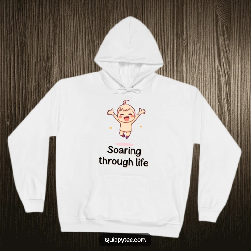 Funny hoodie featuring a kawaii character leaping joyfully with arms spread wide, blending comfort with an infectious sense of glee.