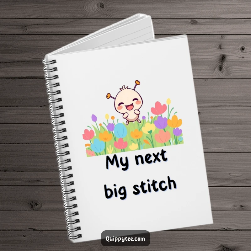 Funny needle character laughing, poking a colorful patch, on the cover of a creative notebook.