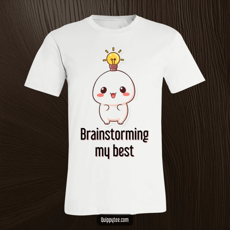 Funny t-shirt featuring a cute kawaii character with a glowing lightbulb overhead, representing inspiration and smart thinking.