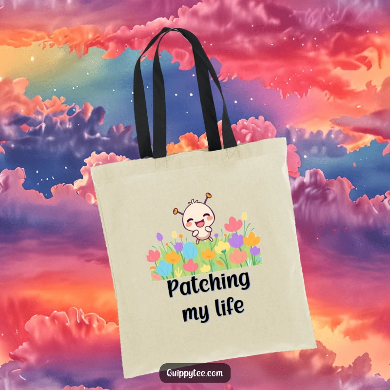 Funny needle character laughing while poking a colorful patch, a stylish and humorous tote bag.